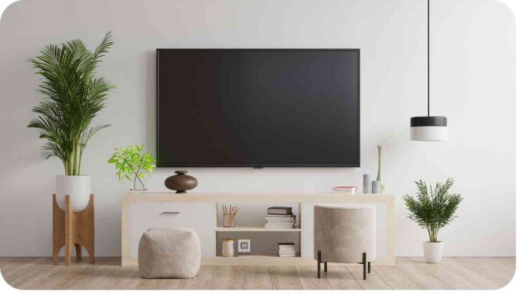 a modern living room with white walls and a large flat screen tv
