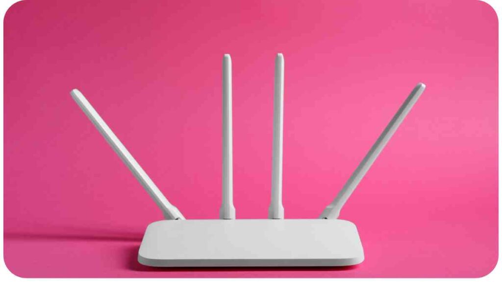 a wireless router on a pink background
